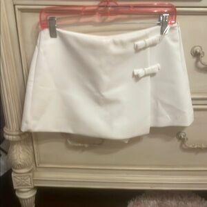 White skirt with bows